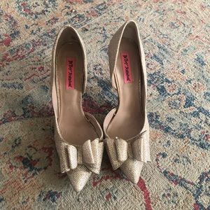 betsey johnson gold glitter heels featuring a bow.